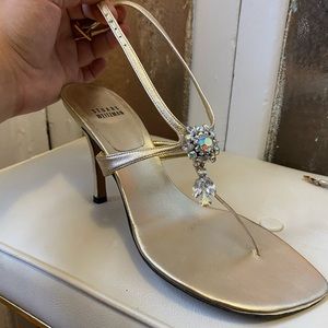 Never Worn Stuart Weitzman Gold Sandal with Tassle